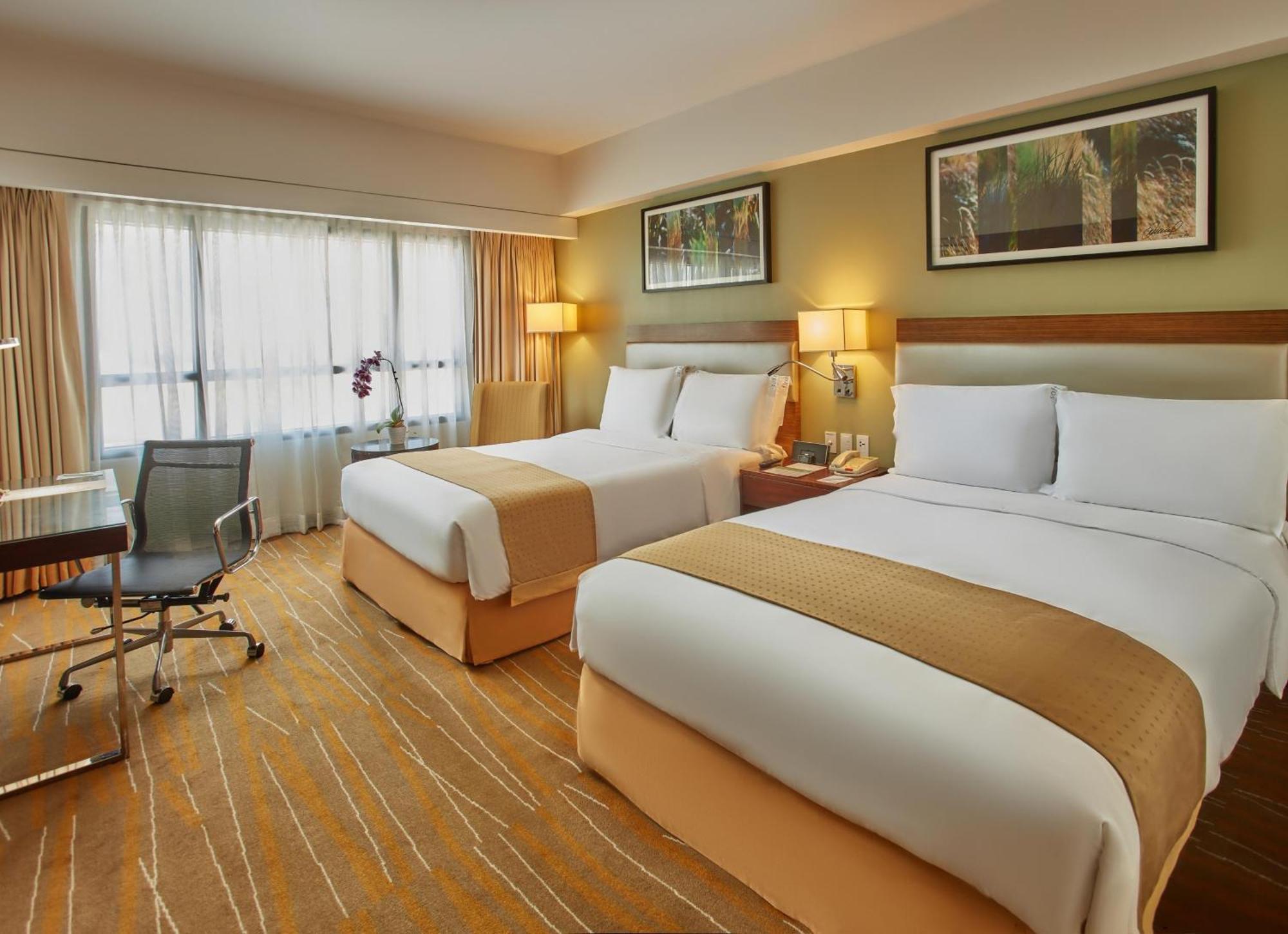 Holiday Inn & Suites Makati By Ihg San Pedro Makati Eksteriør billede Deluxe Room